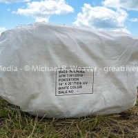 A bale of Chinese made sandbags awaits being filled along the foot of the Nutwood levee.