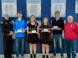 The D.AR.E. scholarship winners from Jersey this year are shown. Shown are D.A.R.E. officer Rich Portwood, Blake Wittman, Caitlin King, Taylor Young, Alec Fry and board member Bob Jones.