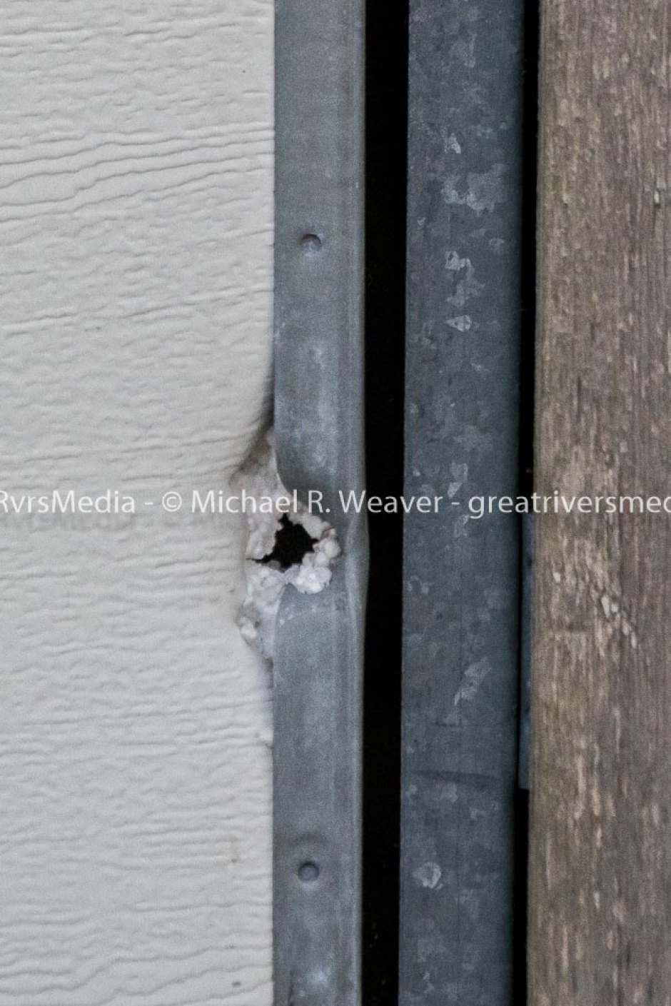 Police Shooting in Jerseyville Bullet that traveled through fence then entered garage door and through back of garage.