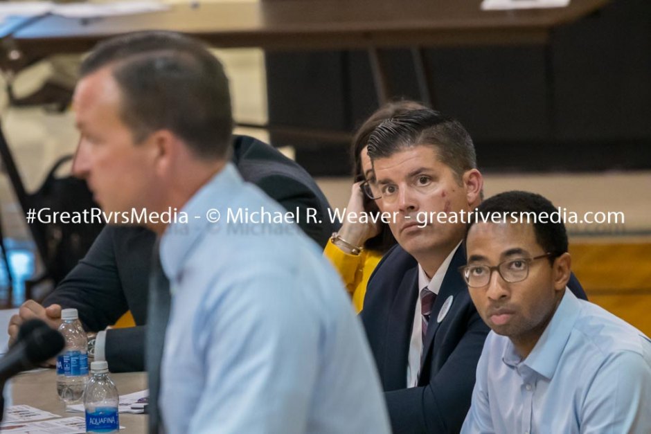 Brad Skertich and Christian Mitchell listen as State Senator Andy Manar speaks at the recent SB1 town hall meeting at Gillespie High School.