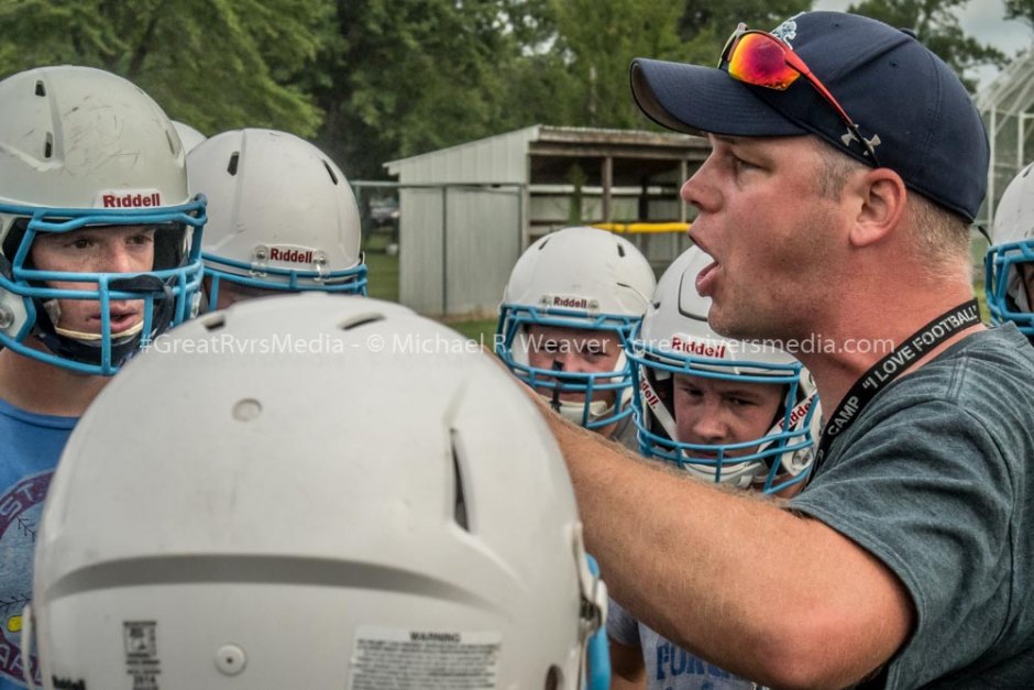 Jersey's coach Adkins reminds the players about the outcome of last year's game at a recent morning practice.